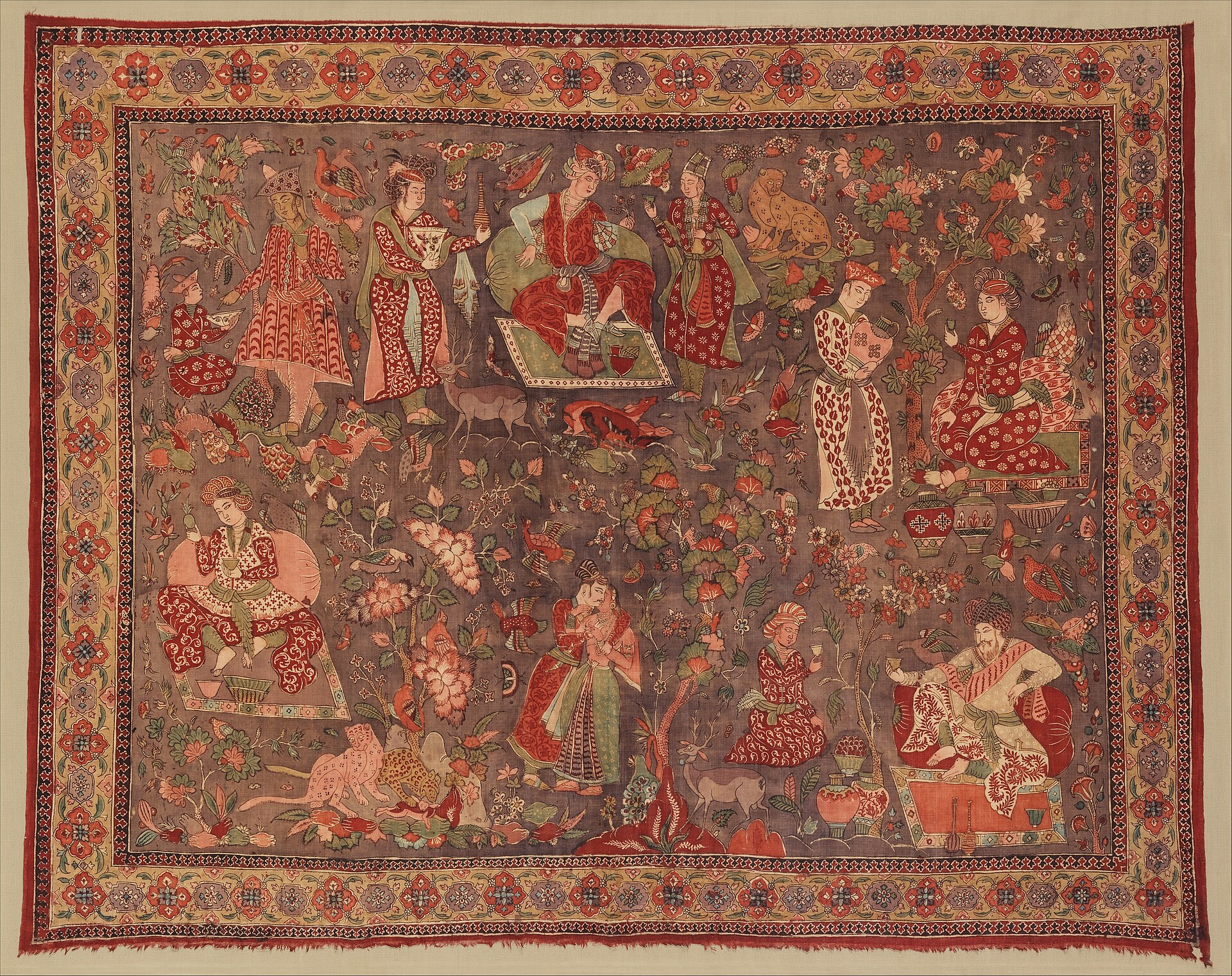 Hand-painted kalamkari textile with repeating floral pattern